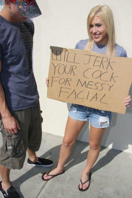 Petite blonde Megan Moore jerks off a long penis for a mouthful of sperm.jpg